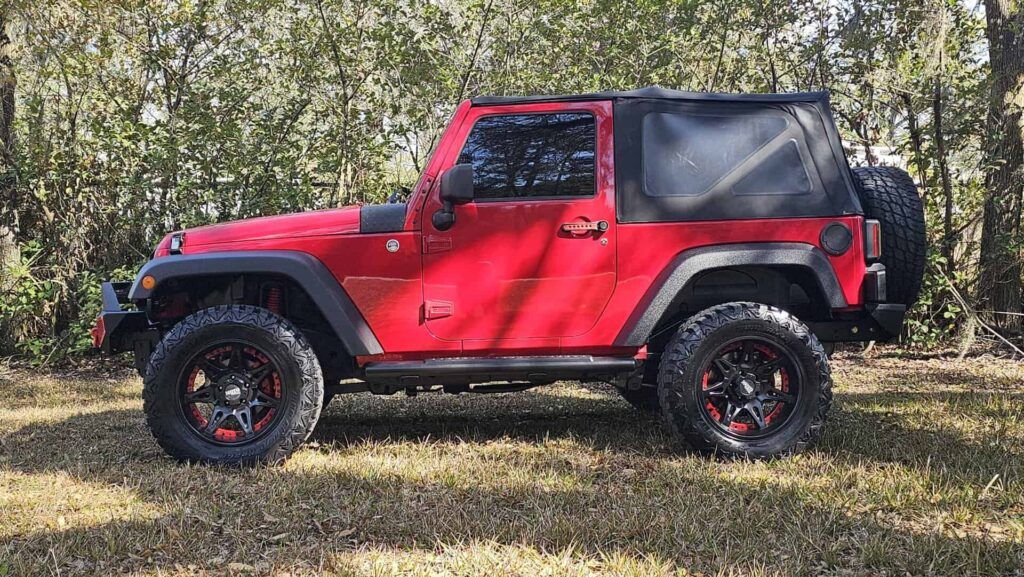 2012 Jeep Wrangler Sport 4x4 - Photo 2 of 59