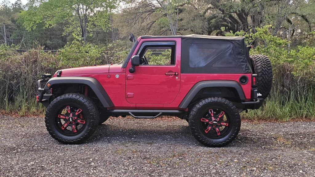 2012 Jeep Wrangler Sport 4x4 - Photo 3 of 77