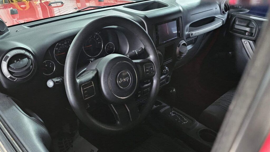 2012 Jeep Wrangler Sport 4x4 - Photo 39 of 77