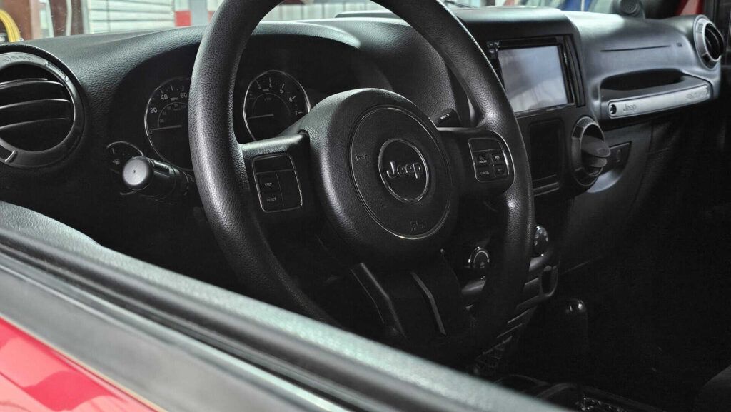 2012 Jeep Wrangler Sport 4x4 - Photo 42 of 77